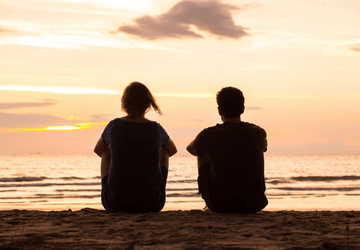 Siblings say goodbye on beach