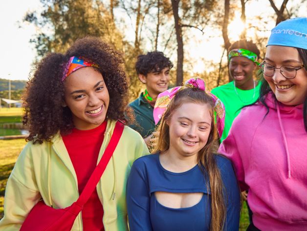 a group of young people wearing bandannas 