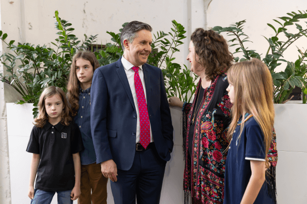 image of a family speaking at the cancer hub event