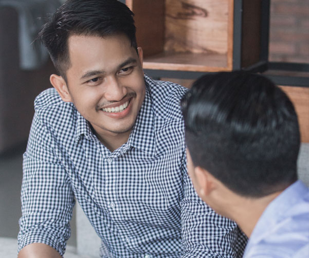 two people engaged in a canteen counselling session