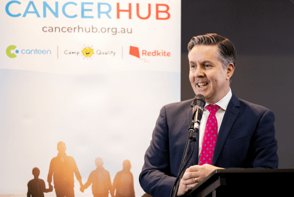 image of someone speaking at the cancer hub event