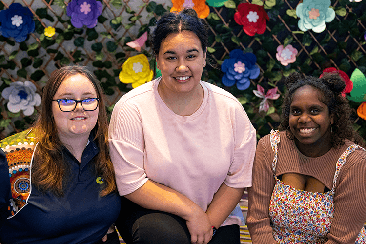 Three women from Canteen's first nations YARN group smiling 