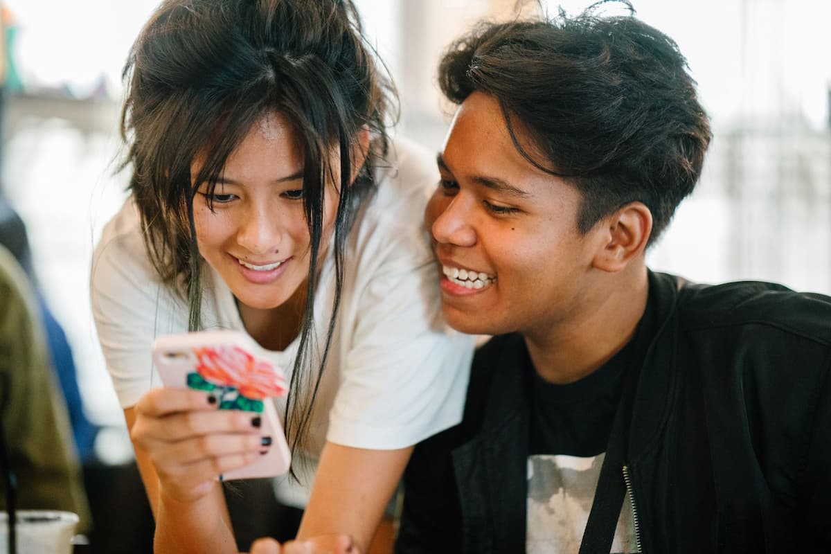 couple looking at phone