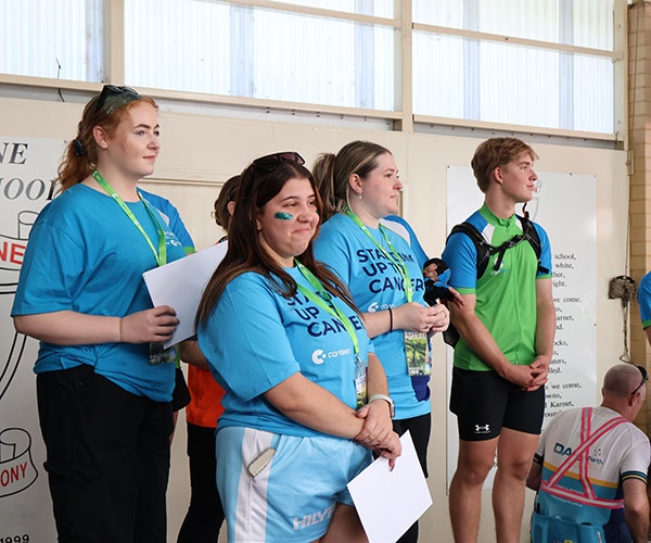 Canteen youth ambassadors on stage speaking to Life Cycle participants