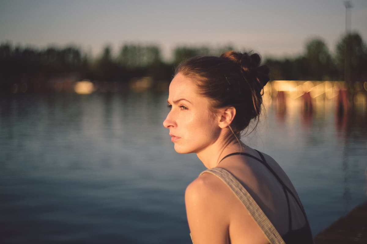 girl dealing with grief looking into distance