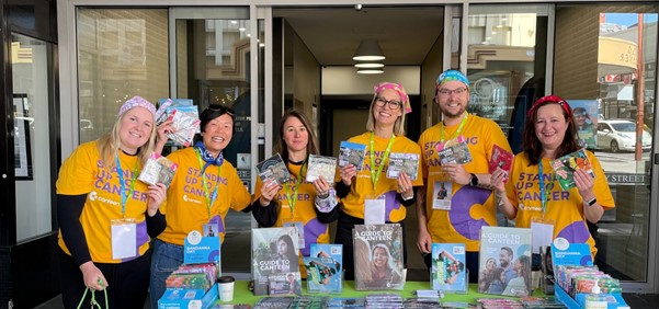 a group of canteen staff selling bandannas in tasmania 