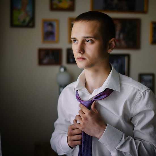 Young man getting ready for work