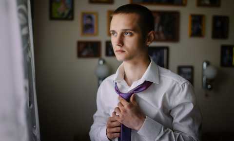 Young man getting ready for work