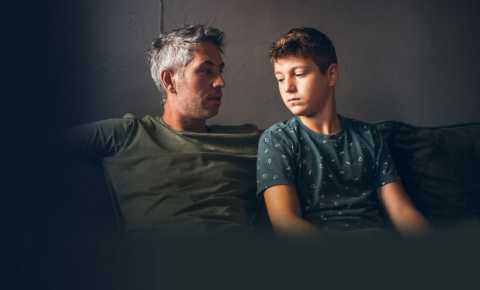 Father talking to son about cancer