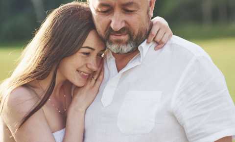 father and daughter hugging