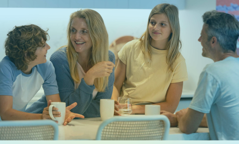 family talking in the kitchen