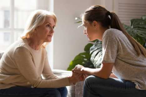 mother and daughter having a conversation