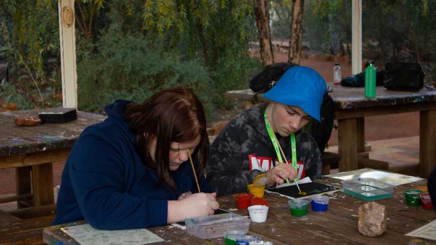 young people creating artwork as part of the Indigenous Australians Under 18s Program