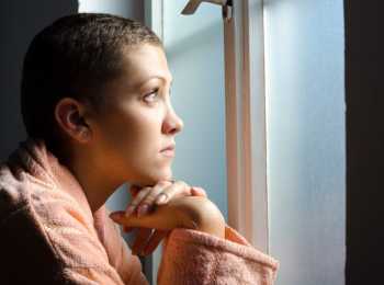 Girl looking out a window